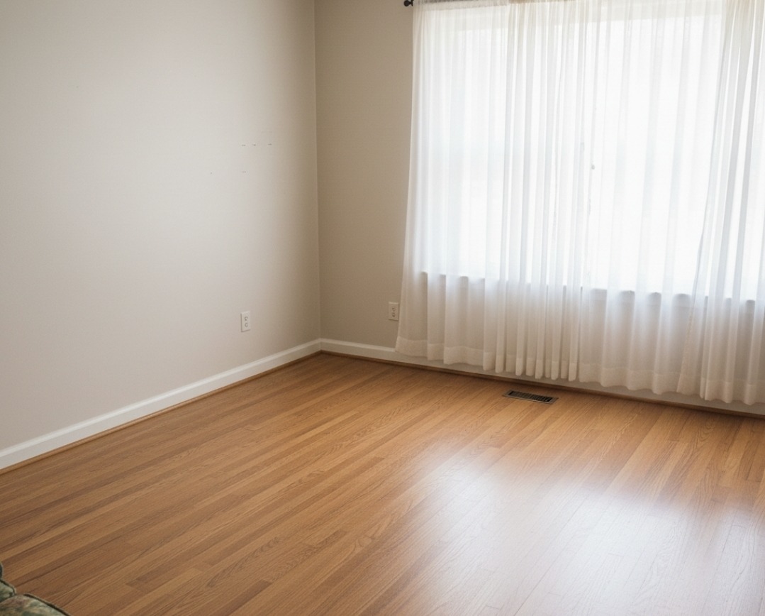 Empty, broom-clean living room after donation hauling and junk removal